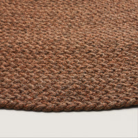 Tapis rond Aiguablava terracotta – vue de côté