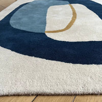 Tapis Inclusion Bleu Orage - Edito