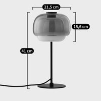 Lampe à poser Kinako rouge – vue de côté allumée